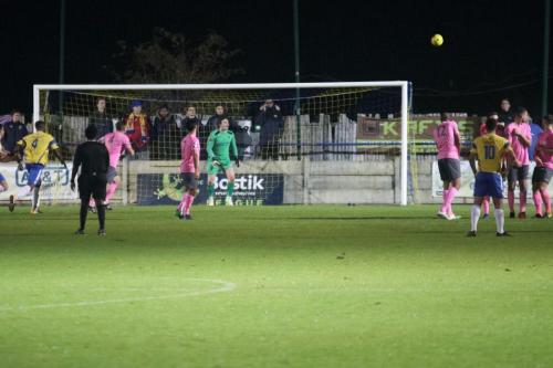 Enfields keeper Joe Wright seems unconcerned as a free kick curls wide of the post