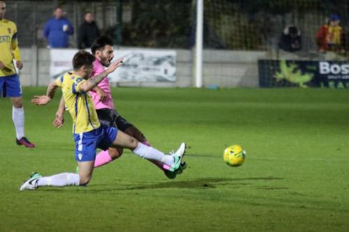 Staines Lewis Driver (yellow) and Enfields Mario Noto