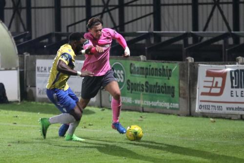 Staines Tyrell Miller-Rodney (L) and Enfields Sam Youngs