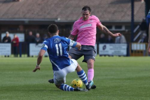 Angels Joe Turner (L) challenges Matt Johnson
