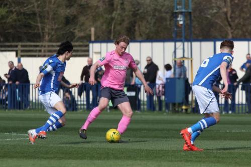 Angels Tommy Whitnell (L) and Callum Adonis-Taylor and Enfields Aaron Greene