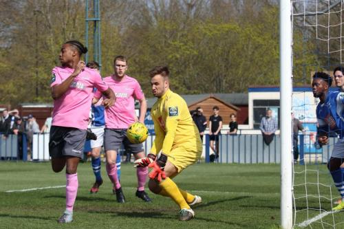 Angels keeepr Jonathan Henley blocks Dernell Wynters backheeled shot (L)  but the rebound falls to Brad Wadkins who opens the scoring