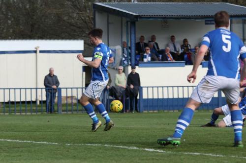 Brad Wadkins (just about visible under the arm of Angels no 5, Sonny Miles) scores the fourth Enfield goal