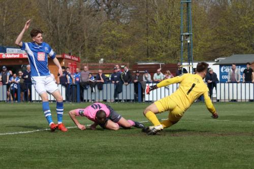 Enfields Brad Wadkins (pink) heads home but is adjudged offside