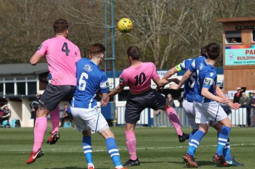 Enfields Dan Rumens (4) and Brad Wadkins challenge Callum Adonis-Taylor (6), Sonny Miles (5) and Liam Smith