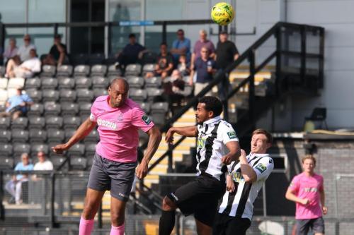 Enfields Simon Thomas (L) heads on goal233