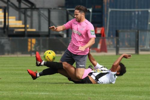 Tootings Ollie Bennett brings down Drew Roberts (pink)229