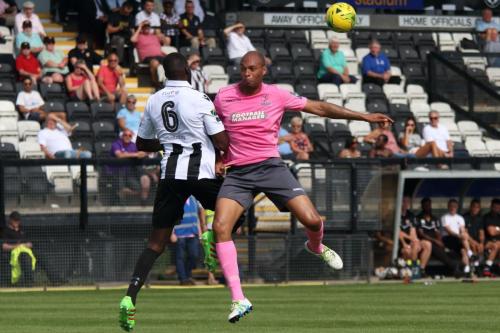 Tootings Quincy Rowe (L) and Enfields Simon Thomas