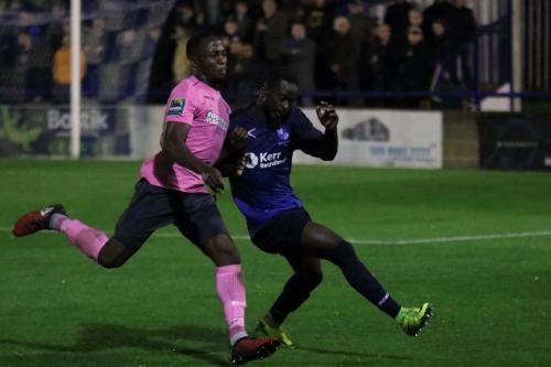 Enfields Ryan Blake (L) and Wingates Nathan Mavila