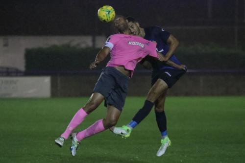 Enfields Simon Thomas (L) and Wingates Joe Kizzi