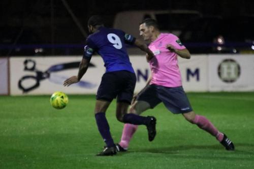 Wingates Marc Charles-Smith (L) and Enfields Darren Purse