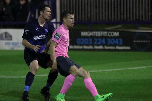 Wingates Sean Cronin (L) and Enfields Ben Ward-Cochrane