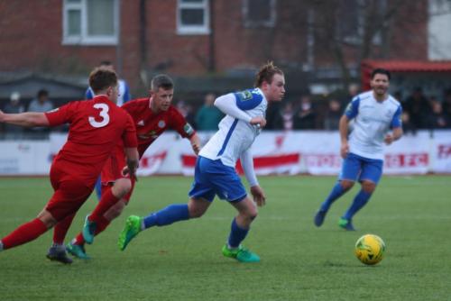 Enfields Aaron Greene breaks clear of Sam Rents (3) and Harvey Sparks