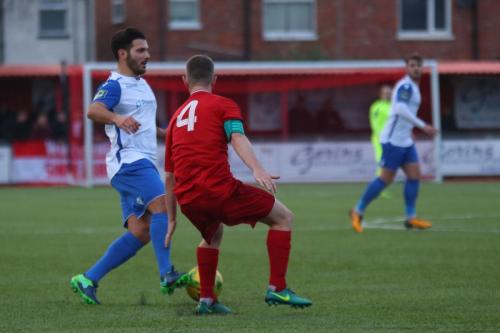 Enfields Mario Noto (L) and Worthings Darren Budd