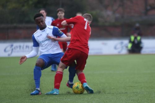 Worthings Harvey Sparks (red) and Enfields Ryan Blake