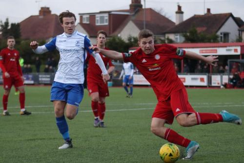Worthings Harvey Sparks clears from Mickey Parcell