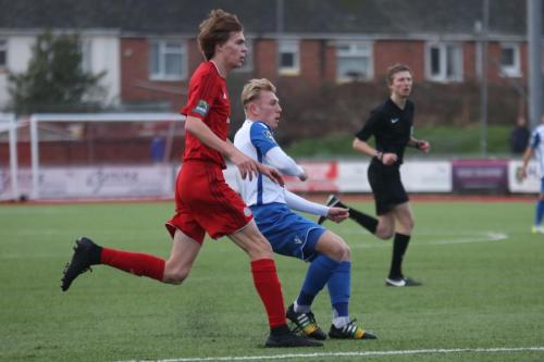 Worthings Joe Clark (red) and Enfields Ryan Blackman