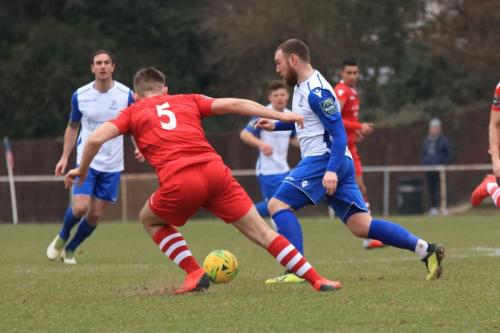 Enfields Billy Bricknell (R) and Hornchurchs Kenzer Lee