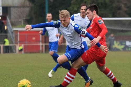 Enfields Ryan Blackman (L) and Hornchurchs Joe Christoux