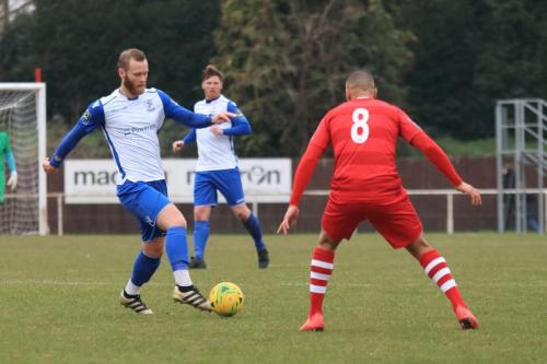 Enfields Sam Hatton (L) and Hornchurchs Lewwis Spence