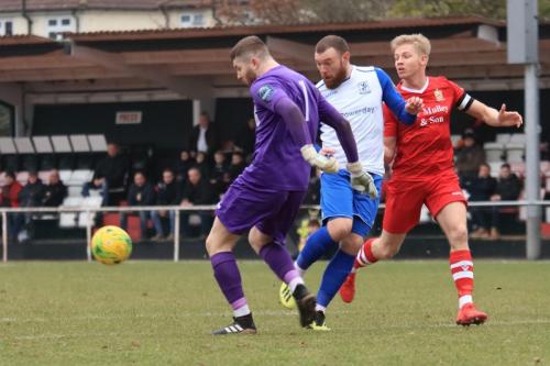 Hornchurch keeper Callum Chafer clears from Billy Bricknell