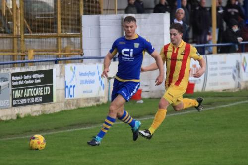 Basingstokes Robert Gerrard (L) and Enfields Lewis Taaffe