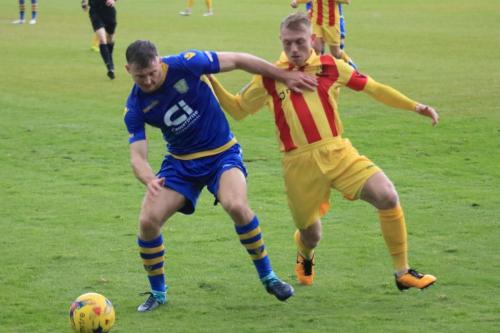 Basingstokes Robert Gerrard (L) and Enfields Ryan Blackman
