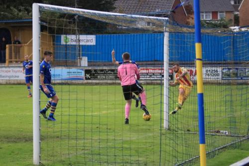 Enfields Billy Bricknell beats keeper Colm McCadden but is ruled offside