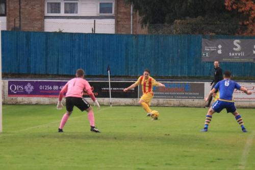 Enfields Lewis Taaffe crosses