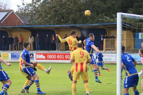 Enfields Sam Youngs (10) challenges Robert Gerrard