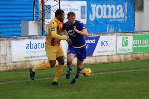 Enfields Taofiq Olomowewe (L) and Basingstokes Robert Gerrard