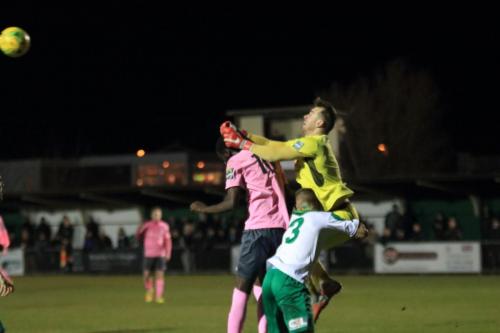 Bognor keeper Dan Lincoln punches clear