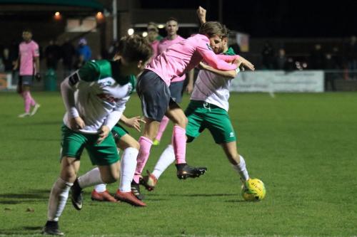 Bognors Harvey Whyte (R) brings down Sam Youngs