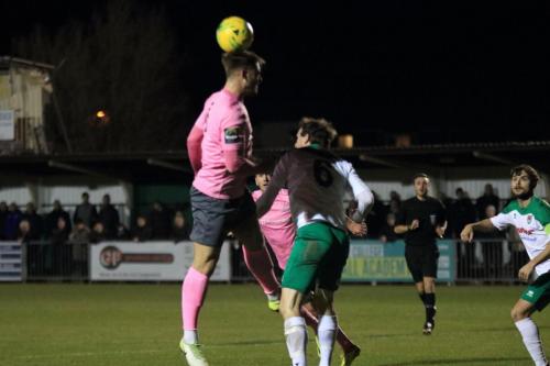 Enfields Dan Rumens (L) wins a header