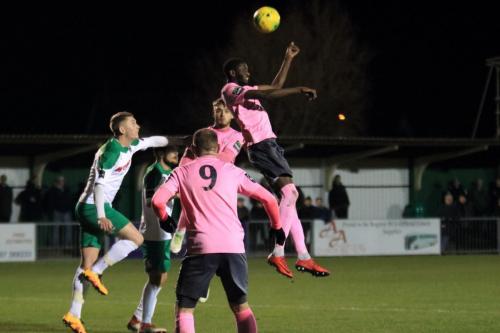 Enfields Muhammadu Faal (R) wins a headerx