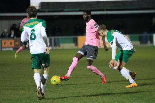 Enfields Muhammadu Faal and Bognors Gary Charman (6) and Chad Field