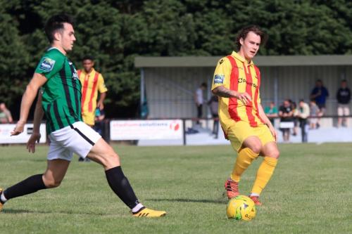 Burgess Hills Conor Tighe (L) and Enfields Sam Chaney