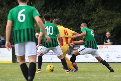 Burgess Hills Dan Beck (R) pulls Sam youngs shirt