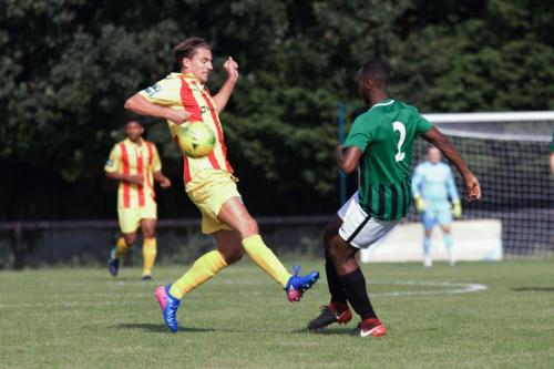Burgess Hills Ibrahim Diallo (R) clears from Sam Youngs