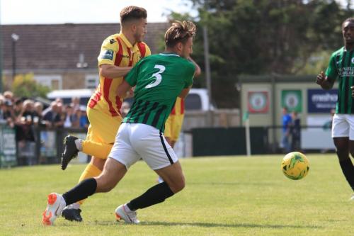 Burgess Hills Tom Cadman (3) tries to hold off Bilal Sayoud