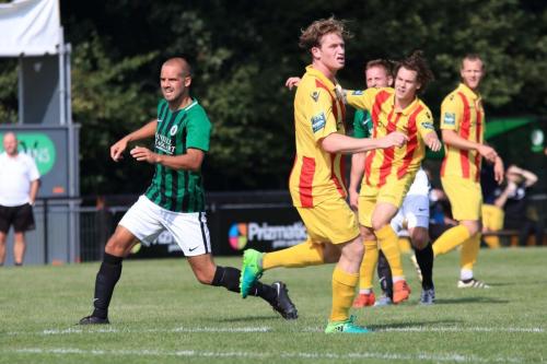 Enfields Sam Chaney (2nd R) shoots