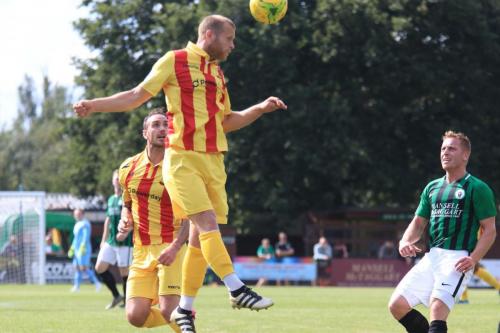 Enfields Sam Hatton heads across goal