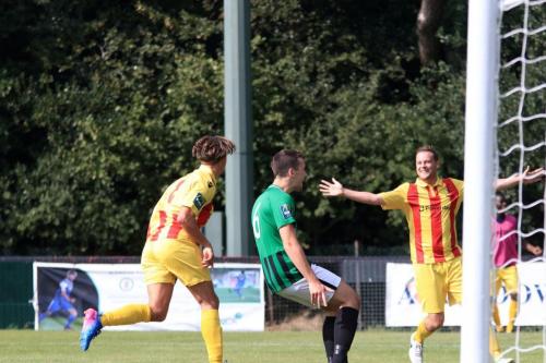 Scorer Sam Youngs (L) and Liam Hope celebrate the third Enfield goal