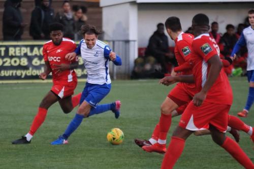 Carshaltons Paris Hamilton-Downes (L) challenges Sam Youngs