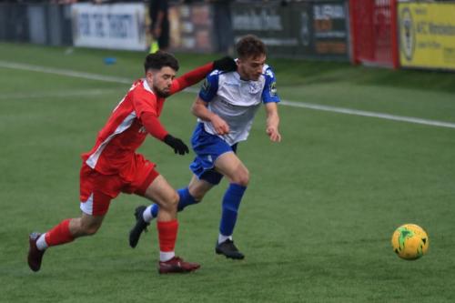 Carshaltons Tommy Bradford (L) and Enfields Bilal Sayoud