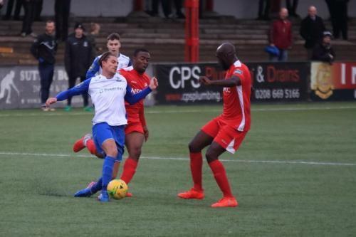 Enfields Sam Youngs and Carshaltons Michale Aziaya and Peter Adeniyi (R)