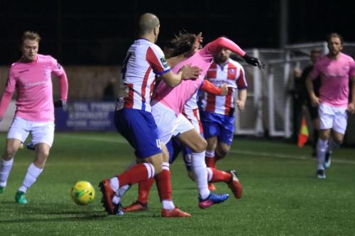Dorkings Sami El-Abd (4) challenges Sam Youngs