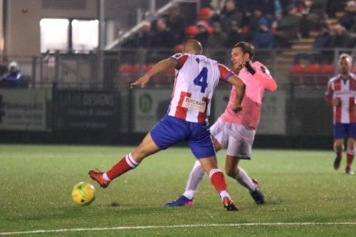 Dorkings Sami El-Abd (L) and Enfields Sam Youngs