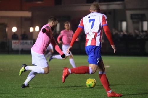Enfields Billy Bricknell (L) and Dorkings Lewis Taylor