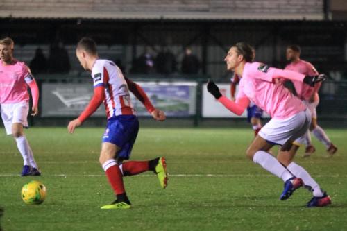 Enfields Sam Youngs (R) tries to close down James McShane